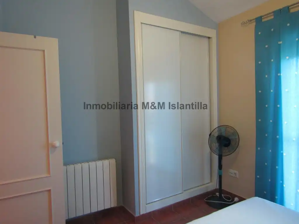 Habitación de Casa adosada en venta en Islantilla con Jardín privado, Terraza y Amueblado