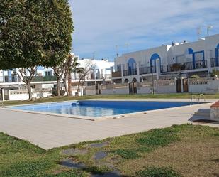 Piscina de Casa adosada en venda en Sant Josep de sa Talaia amb Aire condicionat, Calefacció i Jardí privat