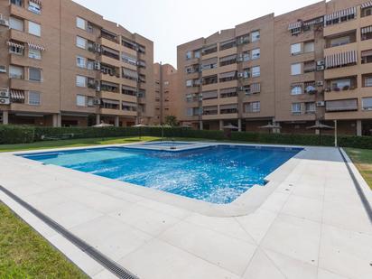 Swimming pool of Attic for sale in  Granada Capital  with Heating, Private garden and Terrace