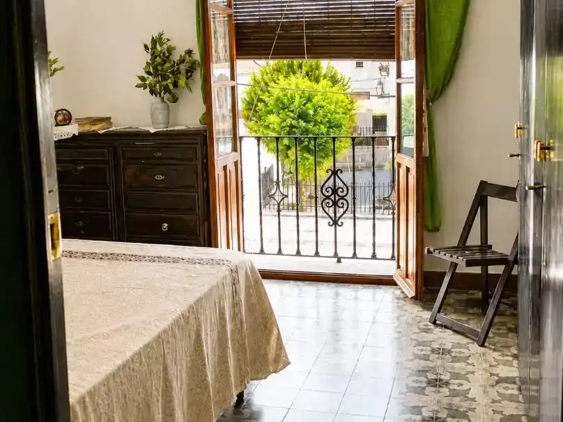 Dormitori de Casa adosada en venda en Pinos Puente amb Balcó