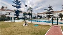 Exterior view of Single-family semi-detached for sale in Vélez-Málaga  with Air Conditioner, Heating and Community pool