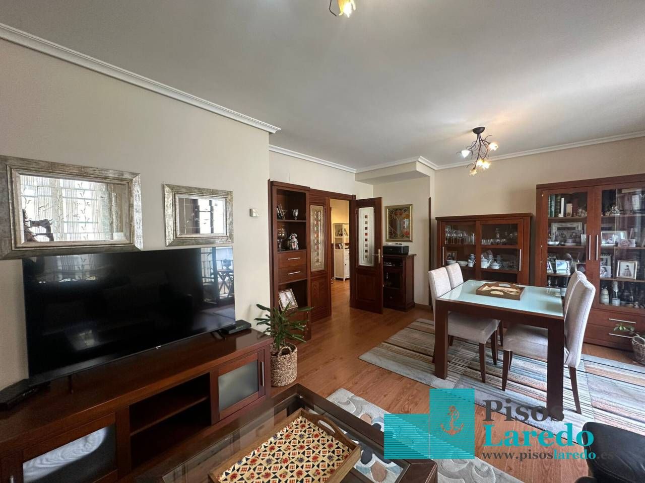 Sala d'estar de Dúplex en venda en Laredo amb Calefacció, Parquet i Terrassa