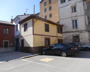 Vista exterior de Casa adosada en venda en Grado amb Terrassa i Traster