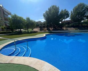 Swimming pool of Planta baja for sale in Salou  with Air Conditioner, Heating and Private garden