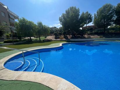 Swimming pool of Planta baja for sale in Salou  with Air Conditioner, Heating and Private garden