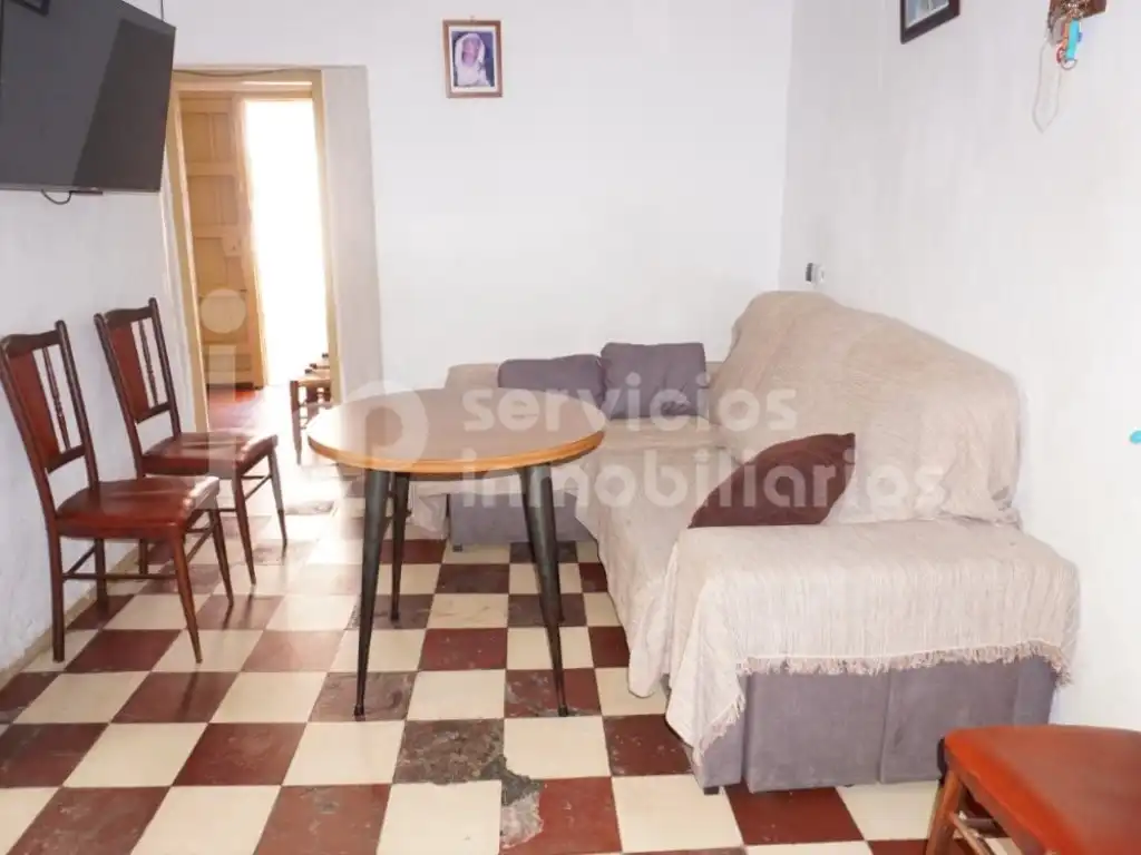 Sala de estar de Casa adosada en venta en Benamocarra con Jardín privado, Terraza y Amueblado