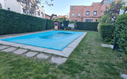 Swimming pool of House or chalet for sale in  Madrid Capital  with Air Conditioner, Terrace and Balcony