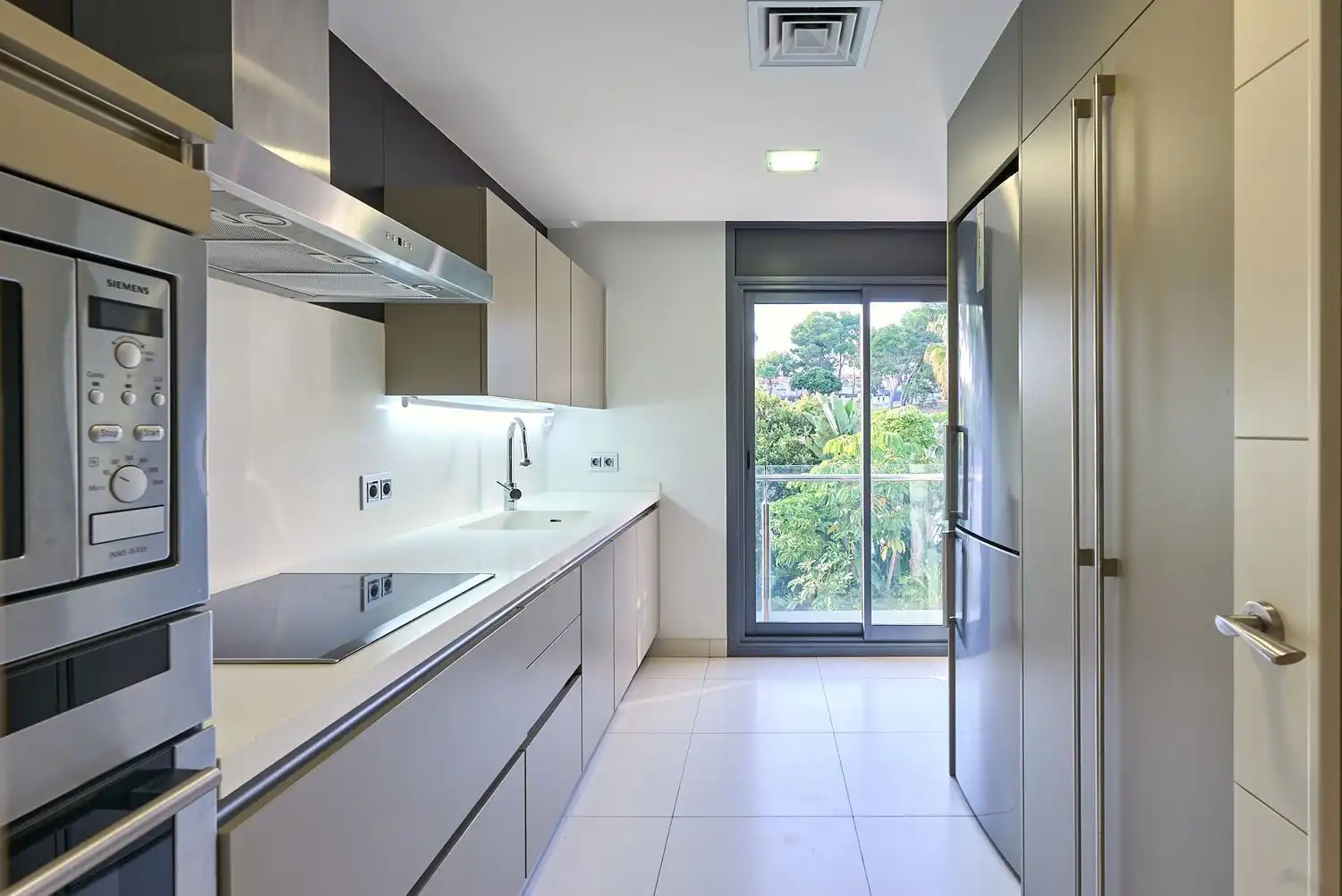 Kitchen of Flat for sale in Sitges  with Air Conditioner, Heating and Private garden