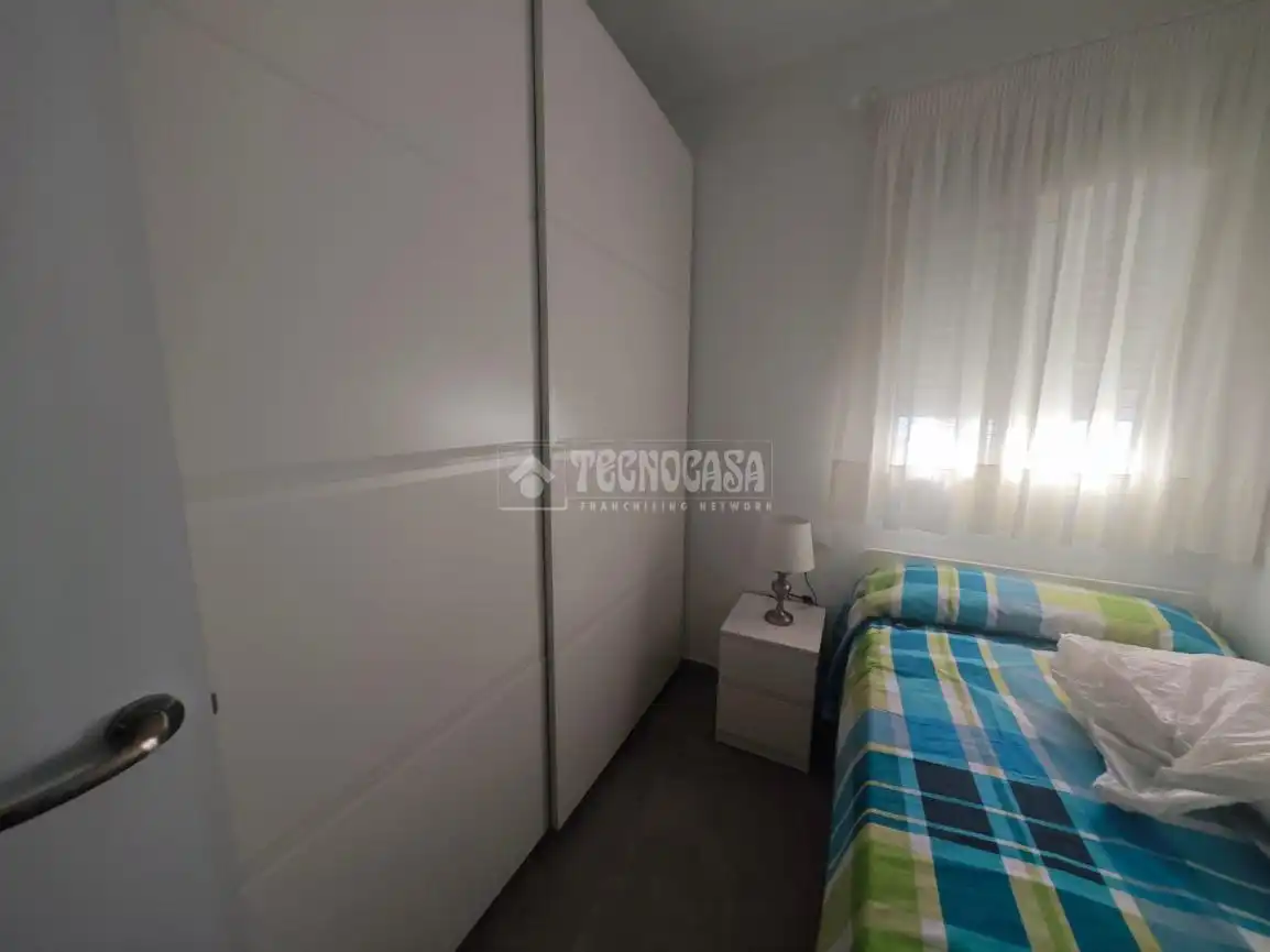 Habitación de Casa adosada en venta en Tomares