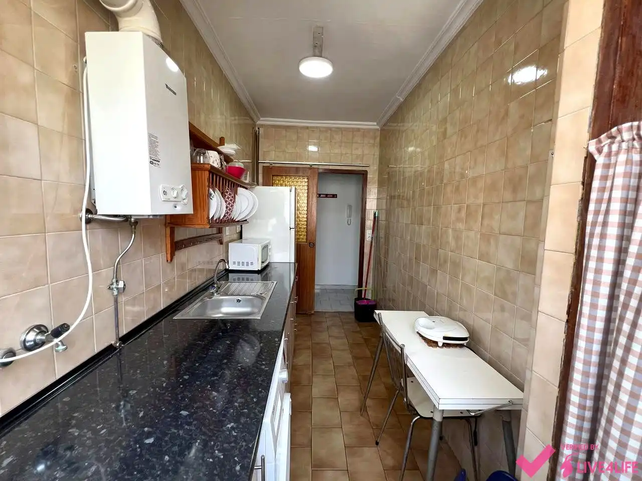 Kitchen of Flat for share in Sevilla  with Air Conditioner, Heating and Furnished