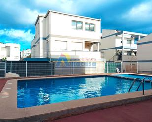 Swimming pool of Single-family semi-detached for sale in Oliva  with Air Conditioner, Terrace and Community pool