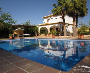 Swimming pool of House or chalet for sale in Lucena  with Air Conditioner, Terrace and Storage room