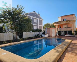 Piscina de Casa o xalet en venda en Oliva amb Aire condicionat, Jardí privat i Terrassa