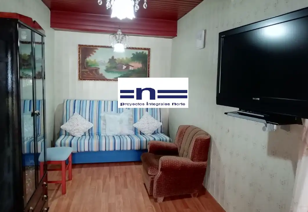 Sala de estar de Casa adosada en venta en Muxía con Amueblado y Balcón