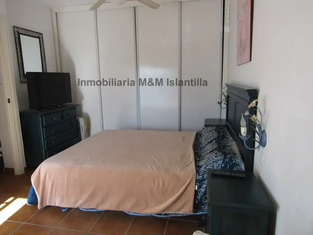 Habitación de Casa adosada en venta en Islantilla con Terraza, Trastero y Amueblado