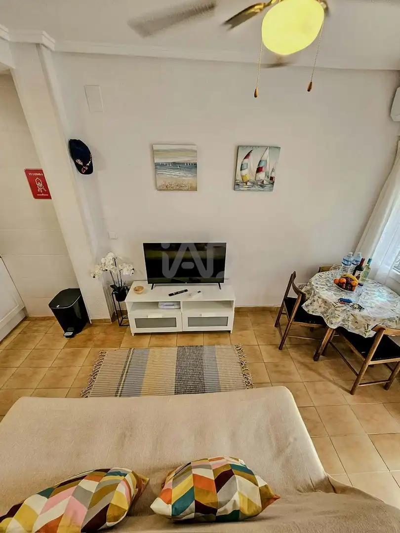 Sala de estar de Casa adosada en venta en Santa Pola con Aire acondicionado, Calefacción y Terraza