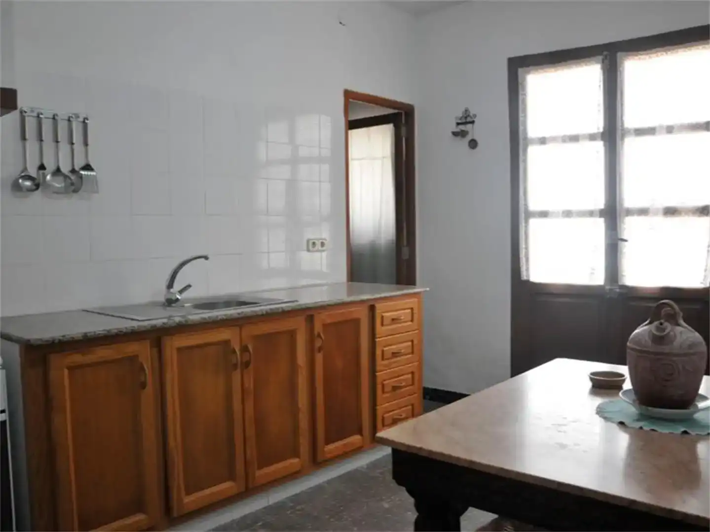 Cocina de Casa adosada en venta en Simat de la Valldigna con Jardín privado, Trastero y Amueblado
