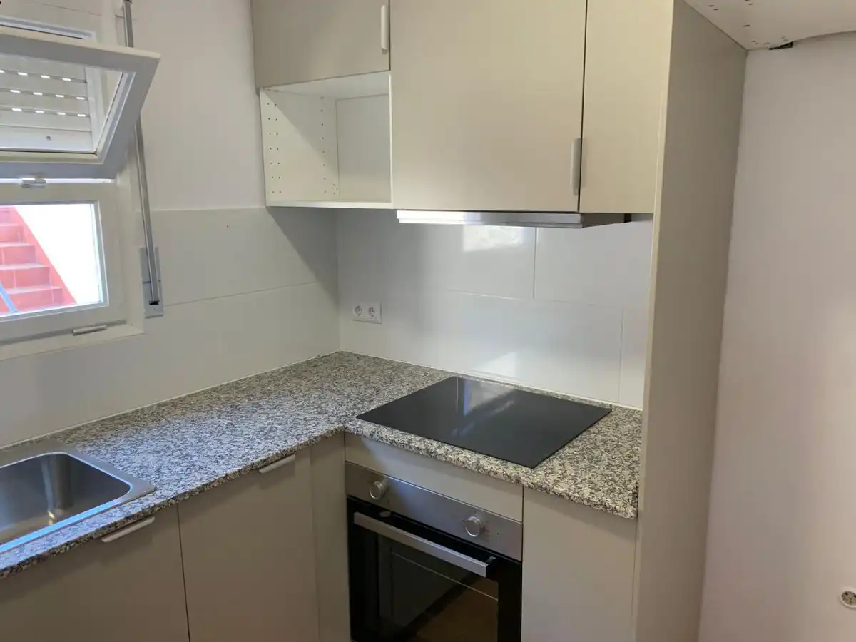 Cuina de Casa adosada en venda en Anglès amb Calefacció, Terrassa i Traster