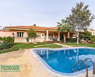 Exterior view of House or chalet for sale in Roquetas de Mar  with Air Conditioner, Heating and Private garden