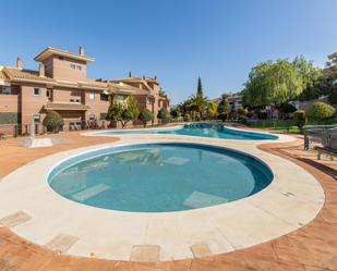 Swimming pool of Flat for sale in La Zubia  with Air Conditioner, Heating and Private garden