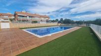 Swimming pool of Single-family semi-detached for sale in Creixell  with Air Conditioner and Terrace