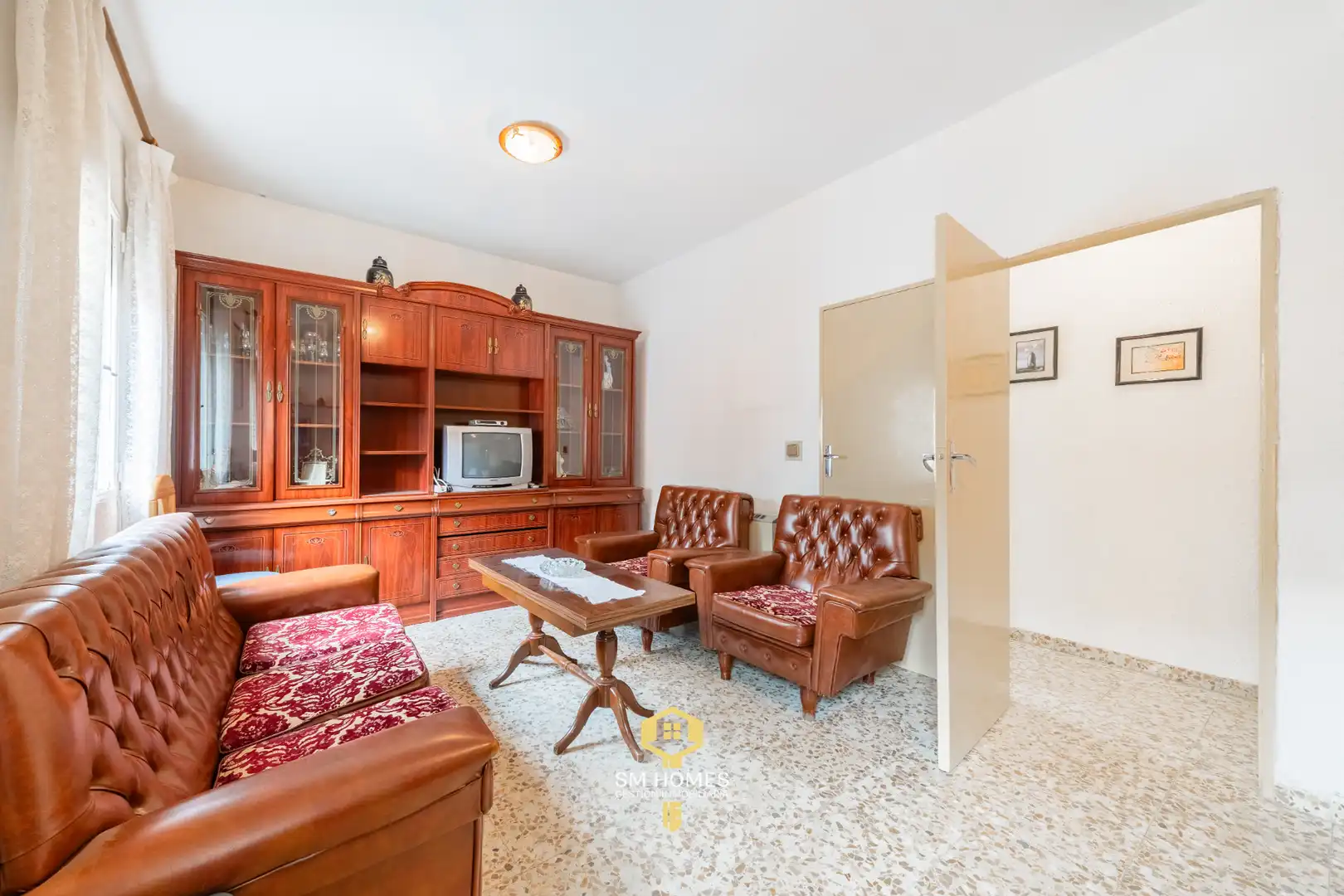 Sala d'estar de Casa adosada en venda en Mejorada del Campo amb Calefacció, Jardí privat i Terrassa