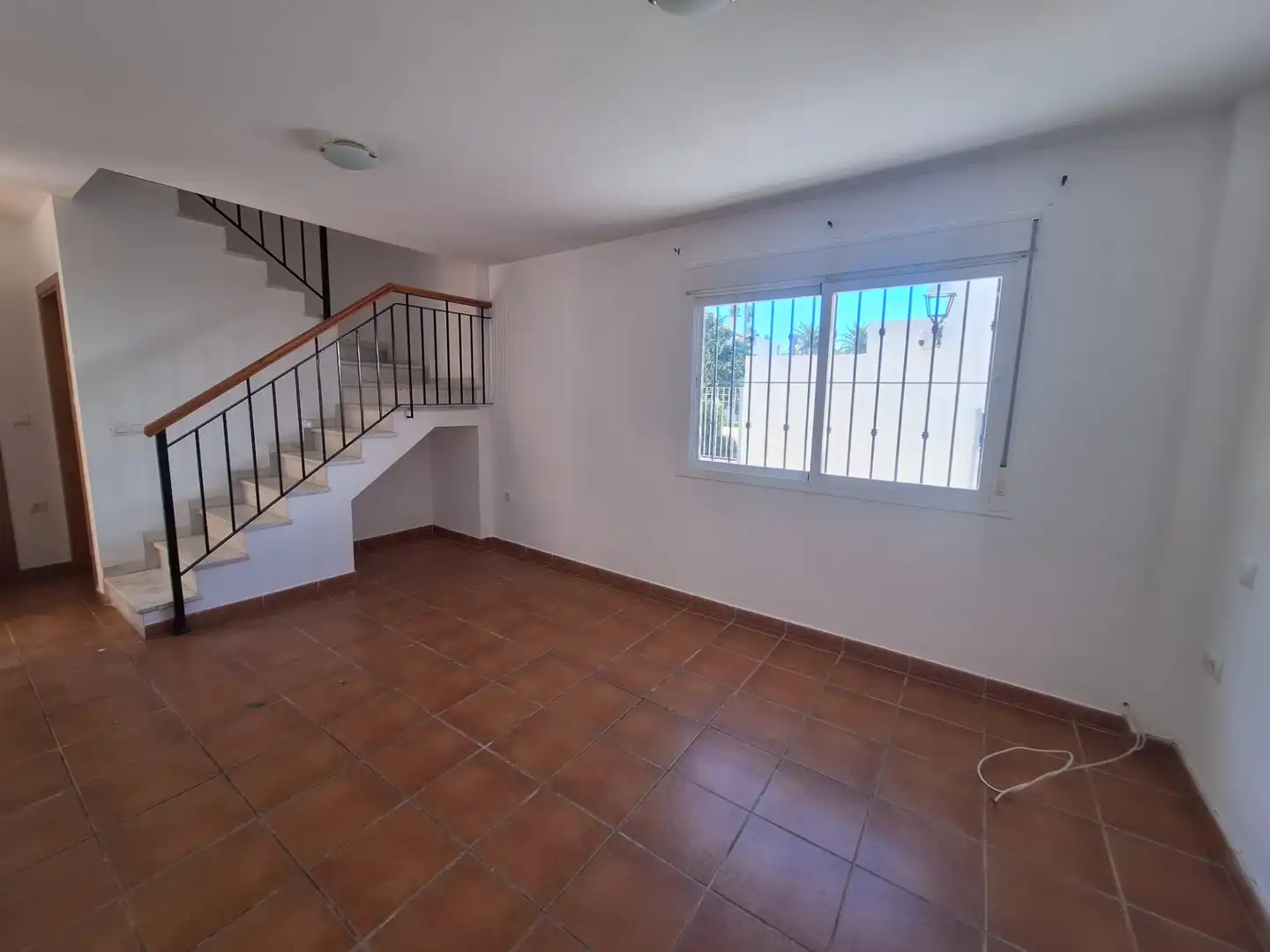 Sala d'estar de Casa adosada en venda en San Roque amb Terrassa, Forn i Rentadora