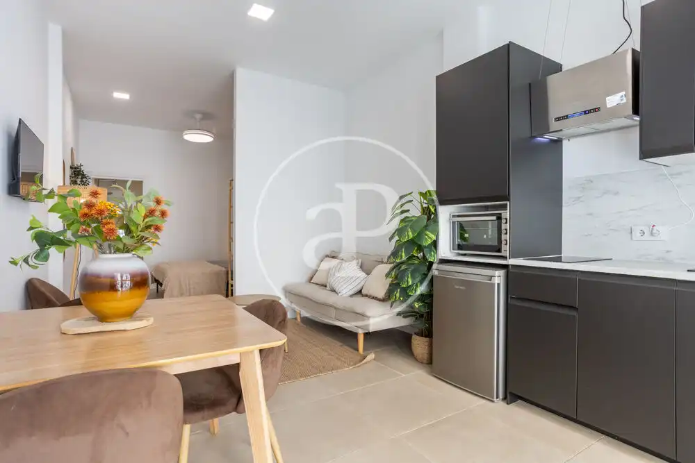 Sala d'estar de Loft de lloguer en Valencia amb Aire condicionat i Moblat