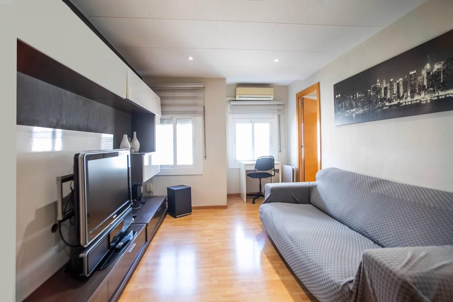 Sala d'estar de Pis de lloguer en  Barcelona Capital amb Aire condicionat i Moblat