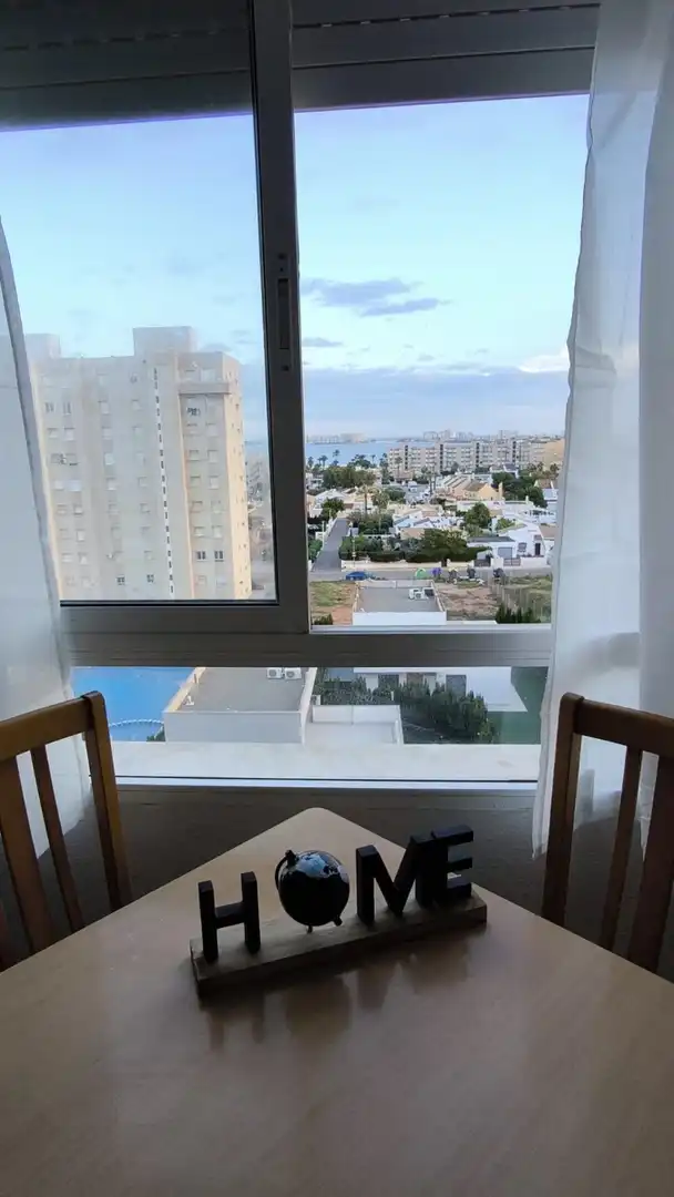 Dormitori de Apartament de lloguer en Cartagena amb Aire condicionat, Piscina i Moblat