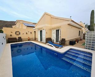 Swimming pool of Single-family semi-detached for sale in Pulpí  with Air Conditioner, Terrace and Storage room