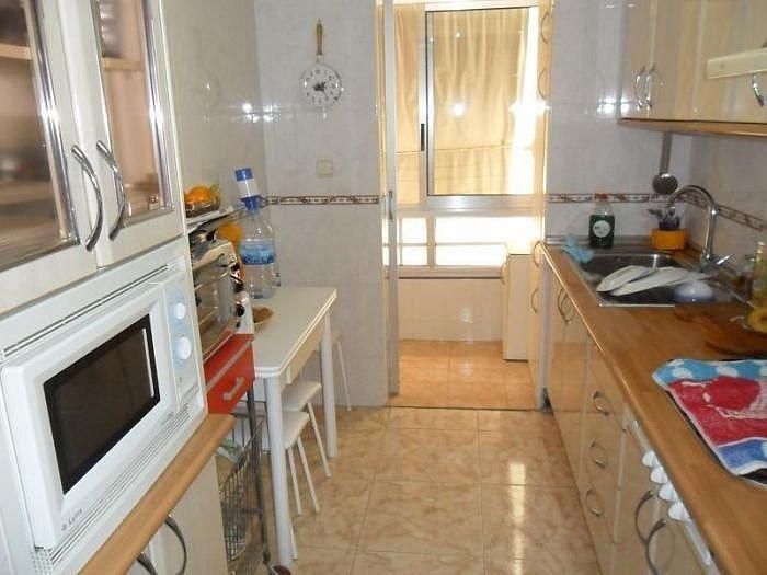 Cuina de Apartament en venda en Benidorm amb Aire condicionat i Terrassa