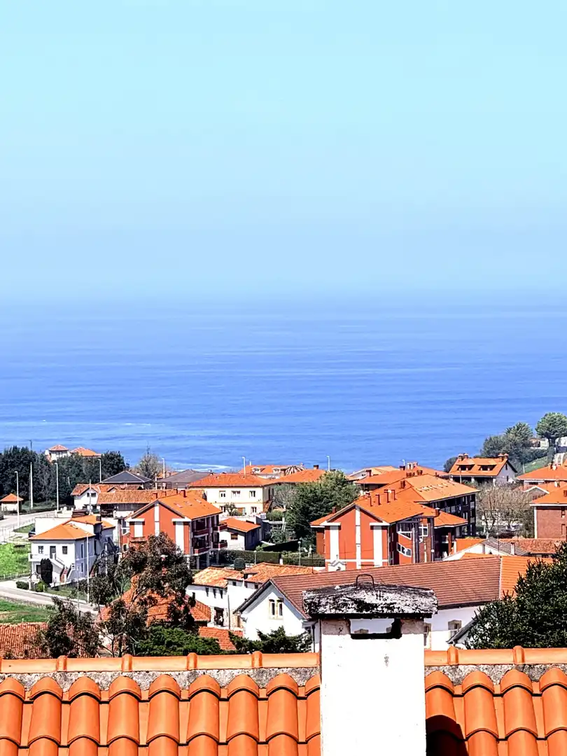 Vista exterior de Casa adosada en venta en Alfoz de Lloredo con Calefacción, Jardín privado y Terraza