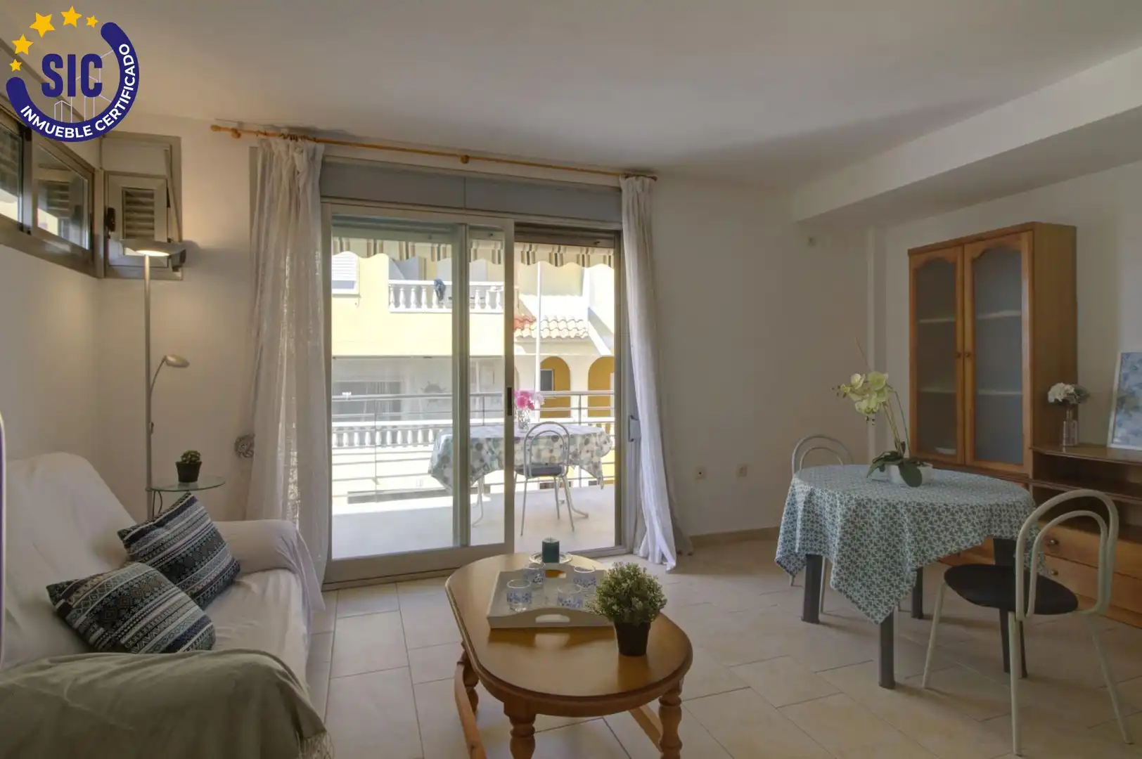 Sala de estar de Casa adosada en venta en Chilches / Xilxes con Jardín privado, Terraza y Amueblado
