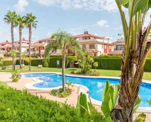 Jardí de Casa adosada de lloguer en Orihuela amb Aire condicionat, Terrassa i Piscina