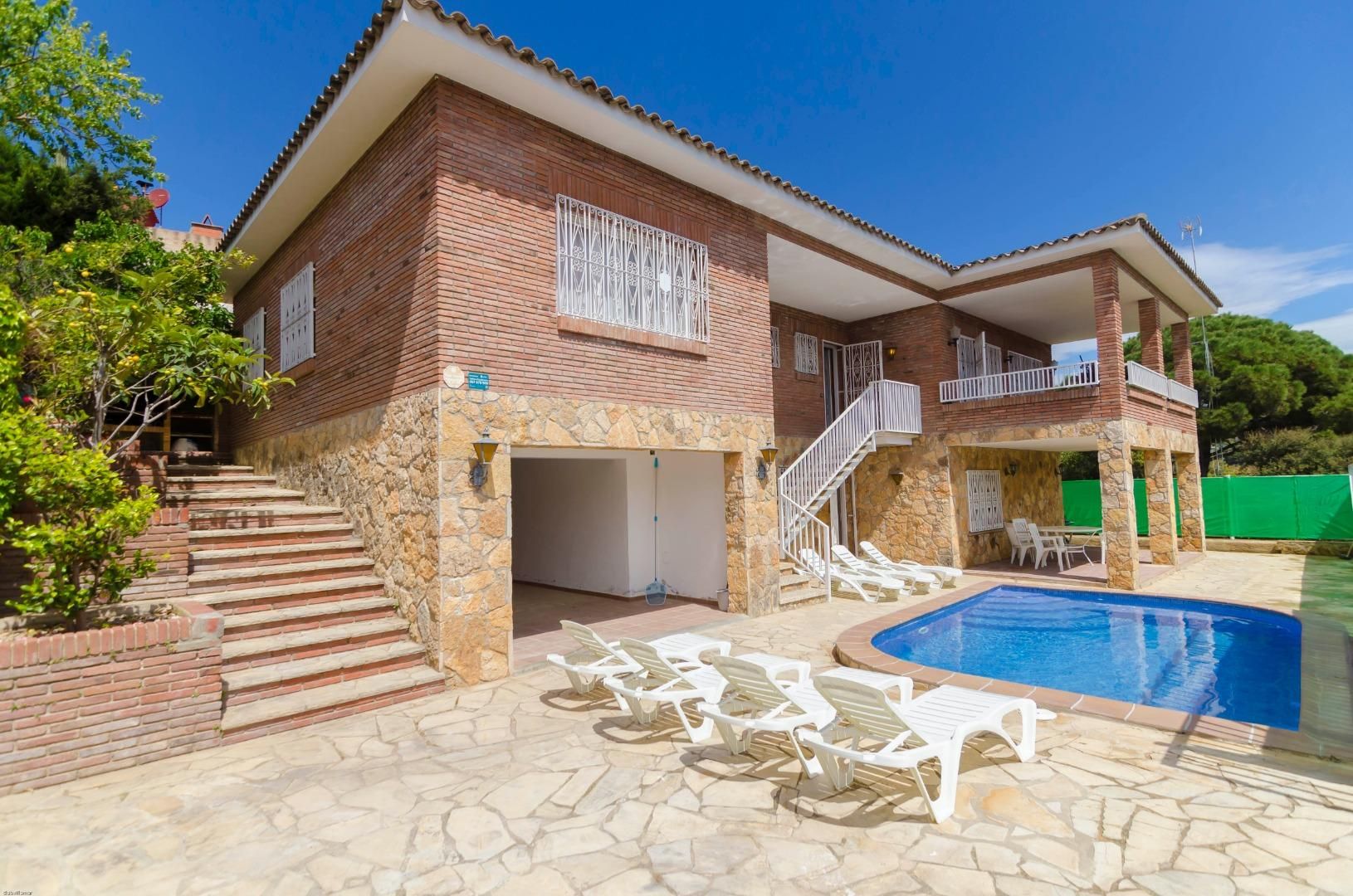 Exterior view of House or chalet for sale in Lloret de Mar  with Swimming Pool and Oven
