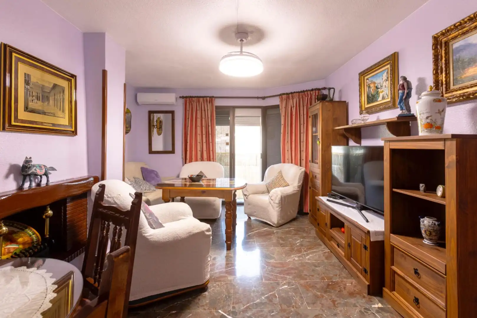 Wohnzimmer von Wohnung zum Verkauf in Almuñécar mit Klimaanlage, Privatgarten und Terrasse