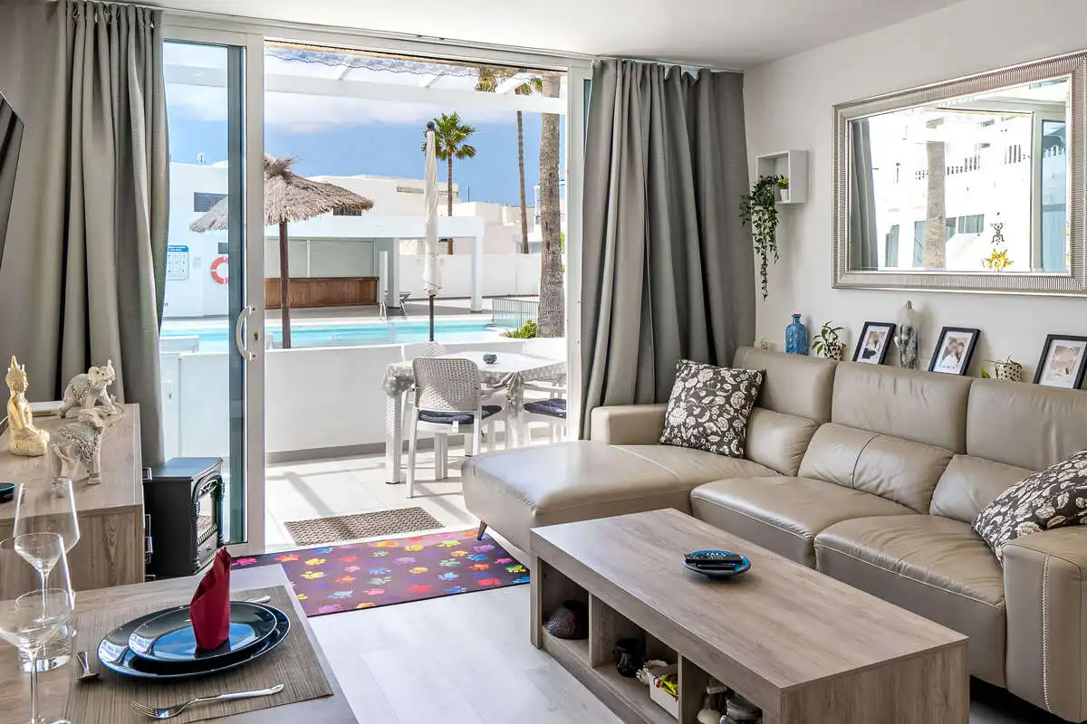 Sala de estar de Piso en venta en Tías con Balcón y Piscina comunitaria