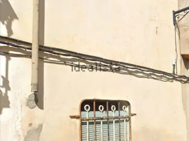 Casa rústica amb jardí en venda a Calle Real 52