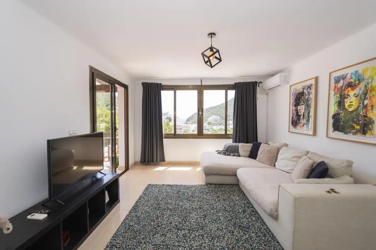 Sala d'estar de Pis en venda en Santa Eulària des Riu amb Aire condicionat, Calefacció i Jardí privat