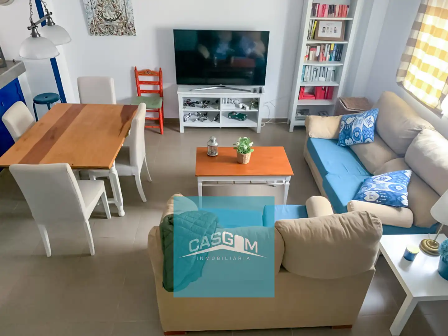 Sala d'estar de Casa adosada en venda en Almonte amb Aire condicionat, Terrassa i Traster