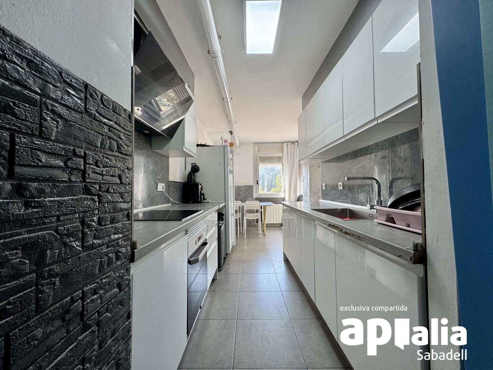 Kitchen of Flat for sale in Sabadell  with Air Conditioner, Storage room and Balcony