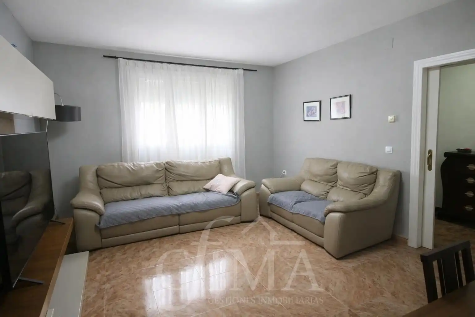 Sala d'estar de Casa o xalet en venda en Tomelloso amb Aire condicionat, Calefacció i Terrassa