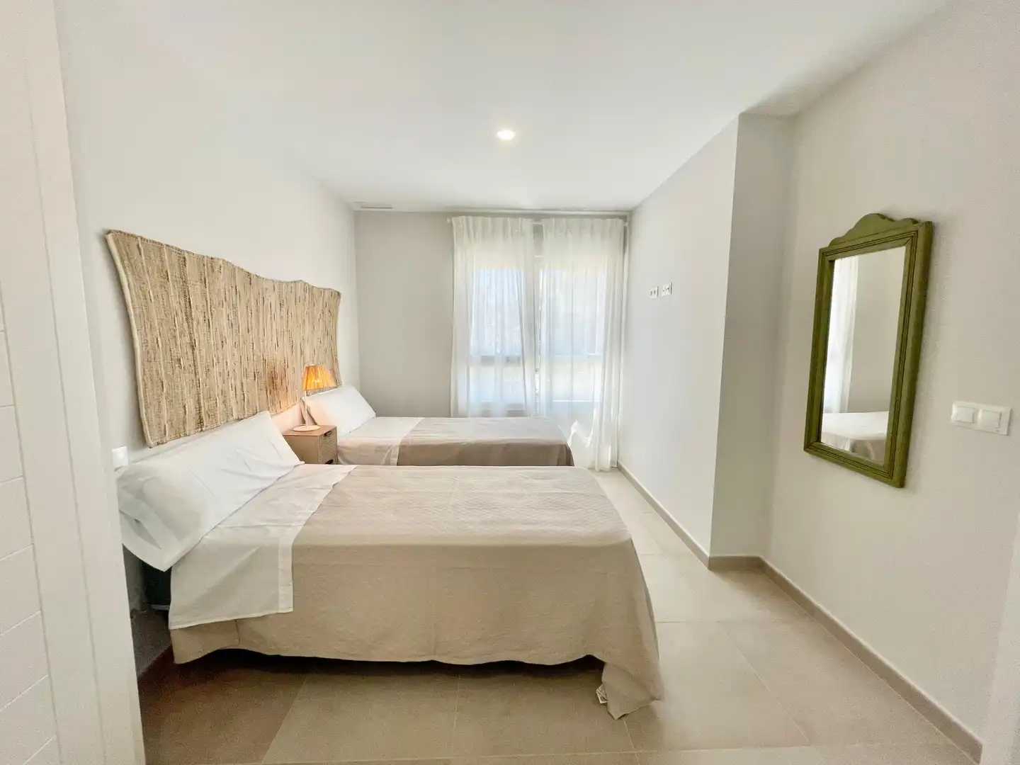 Dormitori de Apartament de lloguer en Ayamonte amb Aire condicionat, Calefacció i Jardí privat