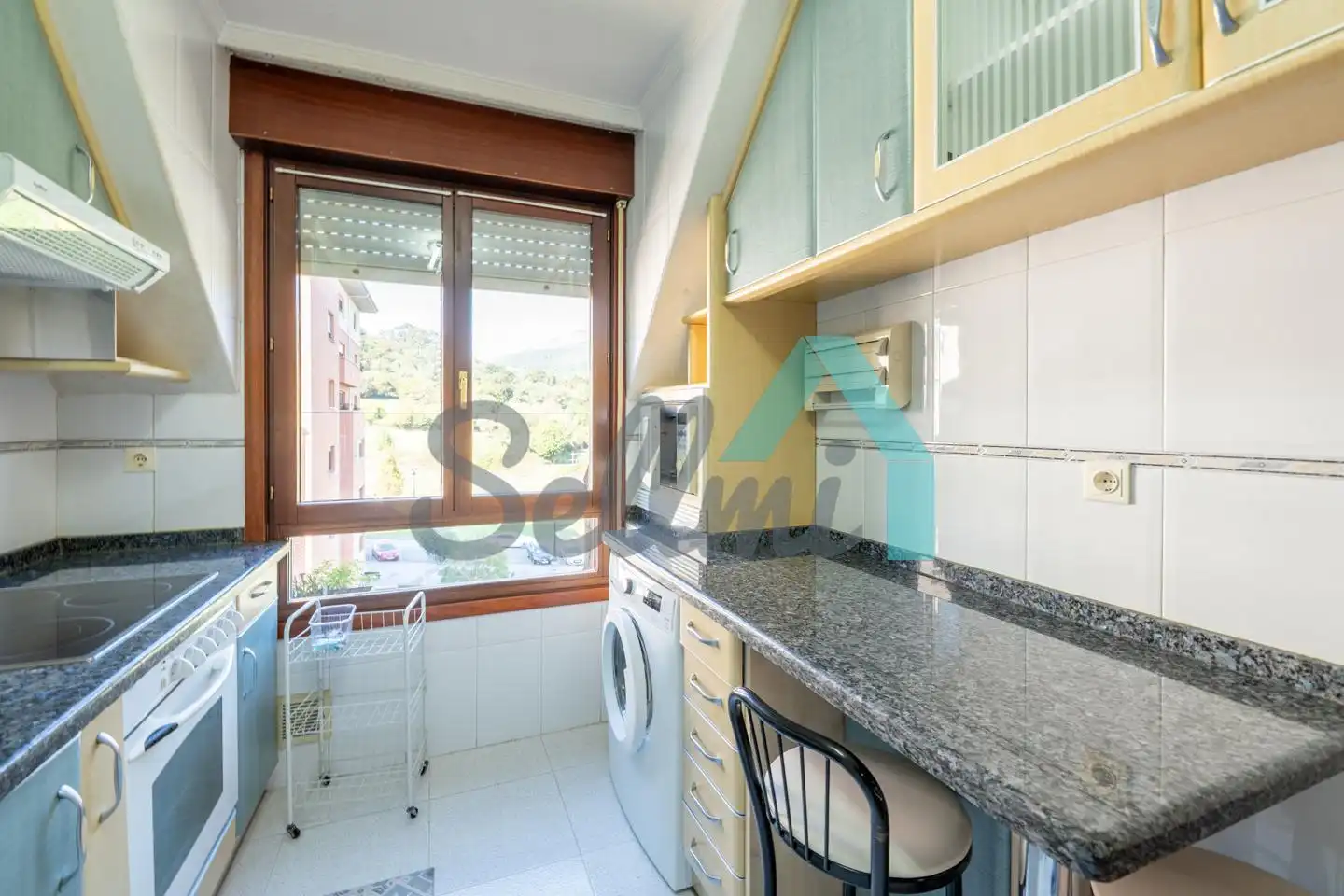 Kitchen of Flat for sale in Oviedo   with Heating, Parquet flooring and Storage room