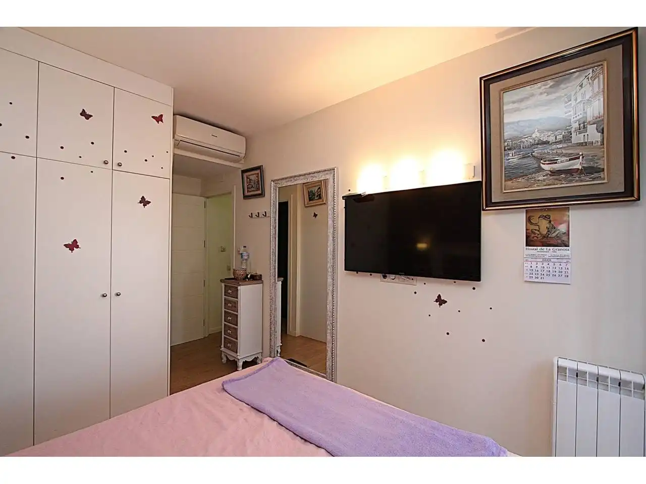 Schlafzimmer von Wohnung zum Verkauf in Lloret de Mar mit Klimaanlage, Heizung und Privatgarten