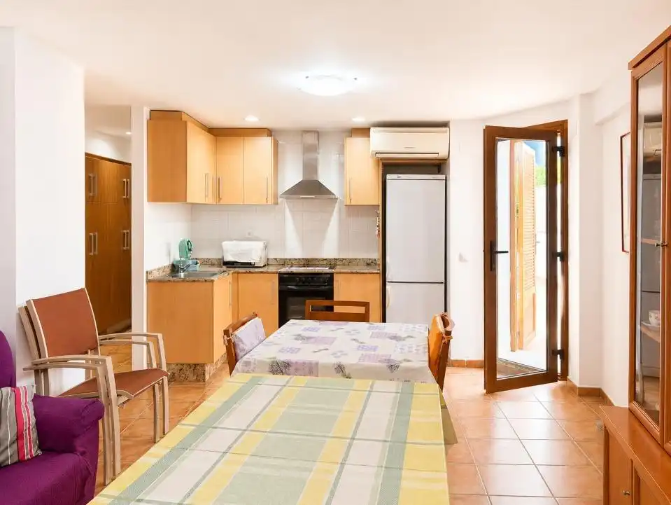 Kitchen of Ground floor for rent in Oliva  with Air Conditioner, Terrace and Furnished
