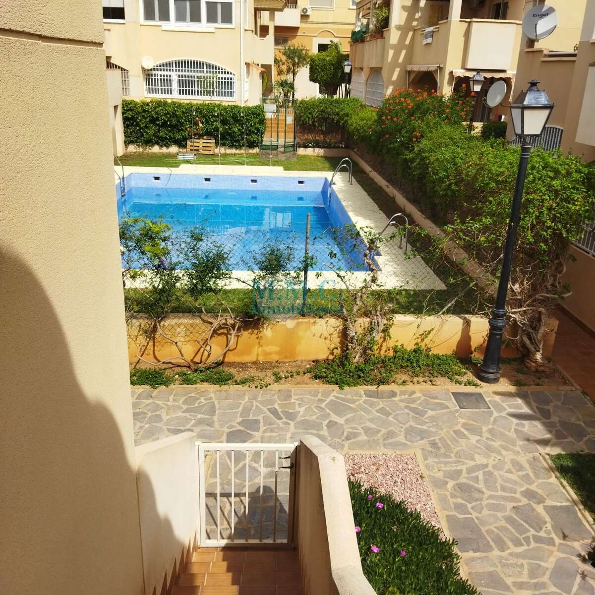 Swimming pool of Duplex for sale in Roquetas de Mar  with Air Conditioner, Heating and Terrace
