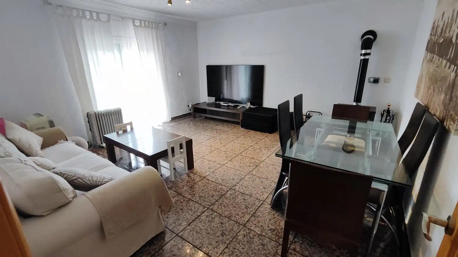 Sala de estar de Casa adosada en venta en Rubí con Trastero