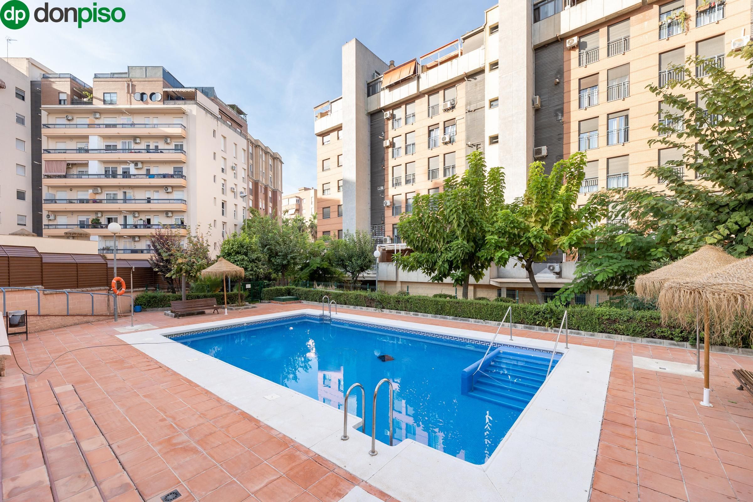 Swimming pool of Apartment for sale in  Granada Capital  with Heating, Private garden and Community pool